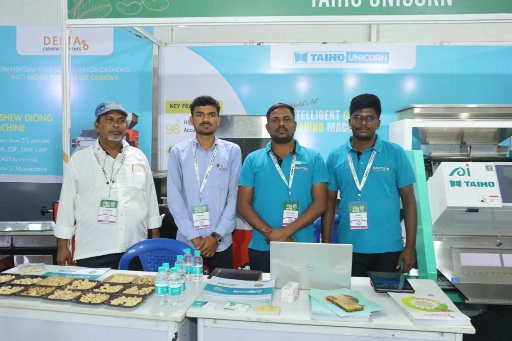 Unicorn Sorter team at an exhibition booth